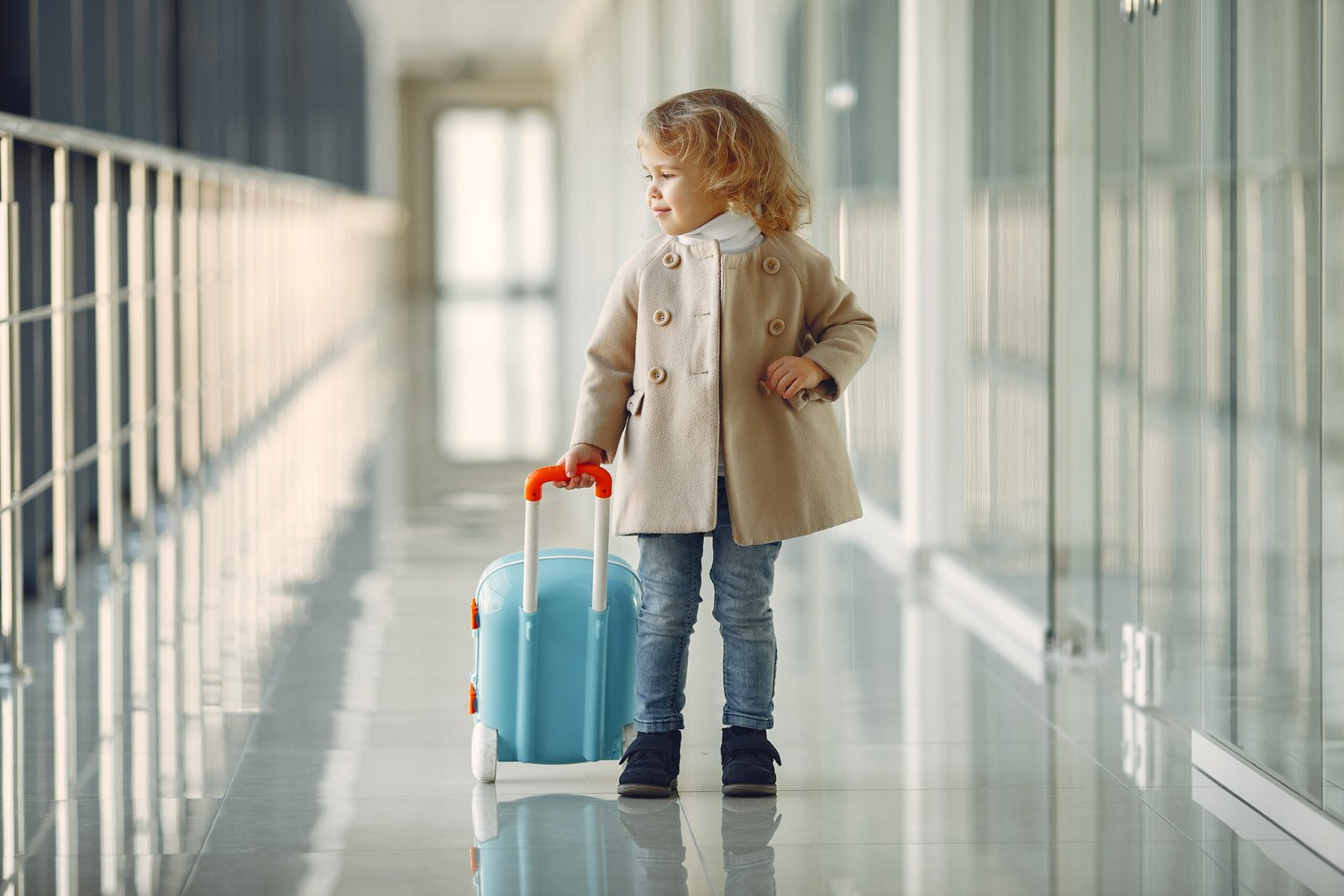 Little girl with suitcase